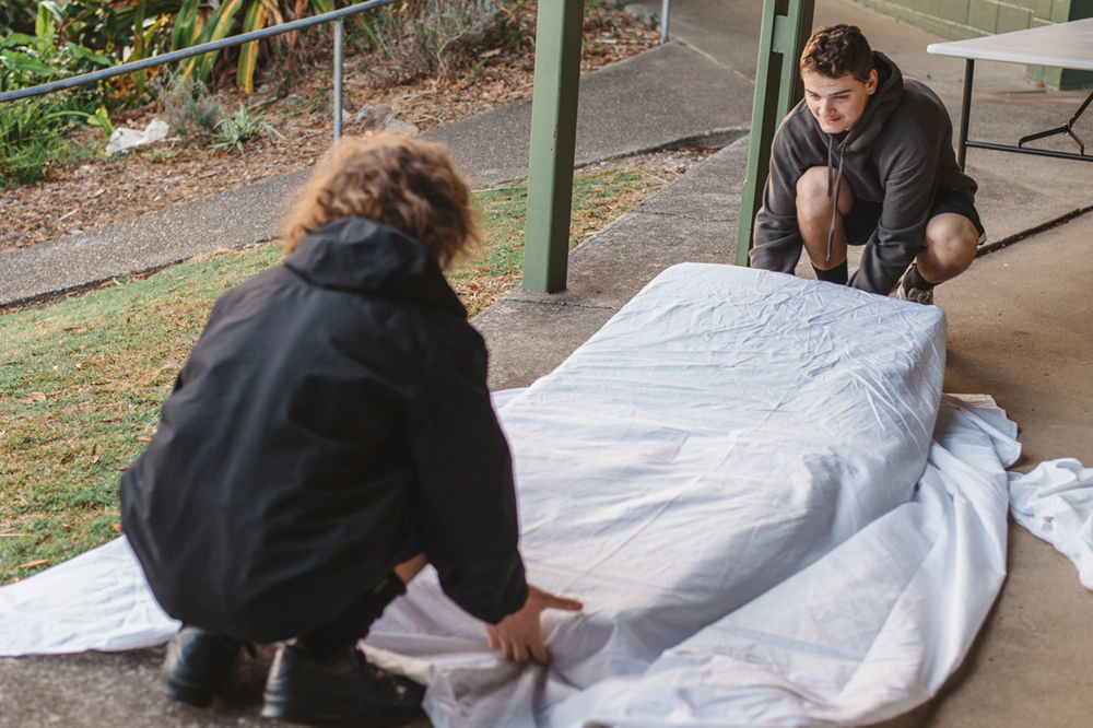 Boot Camp for Kids making beds